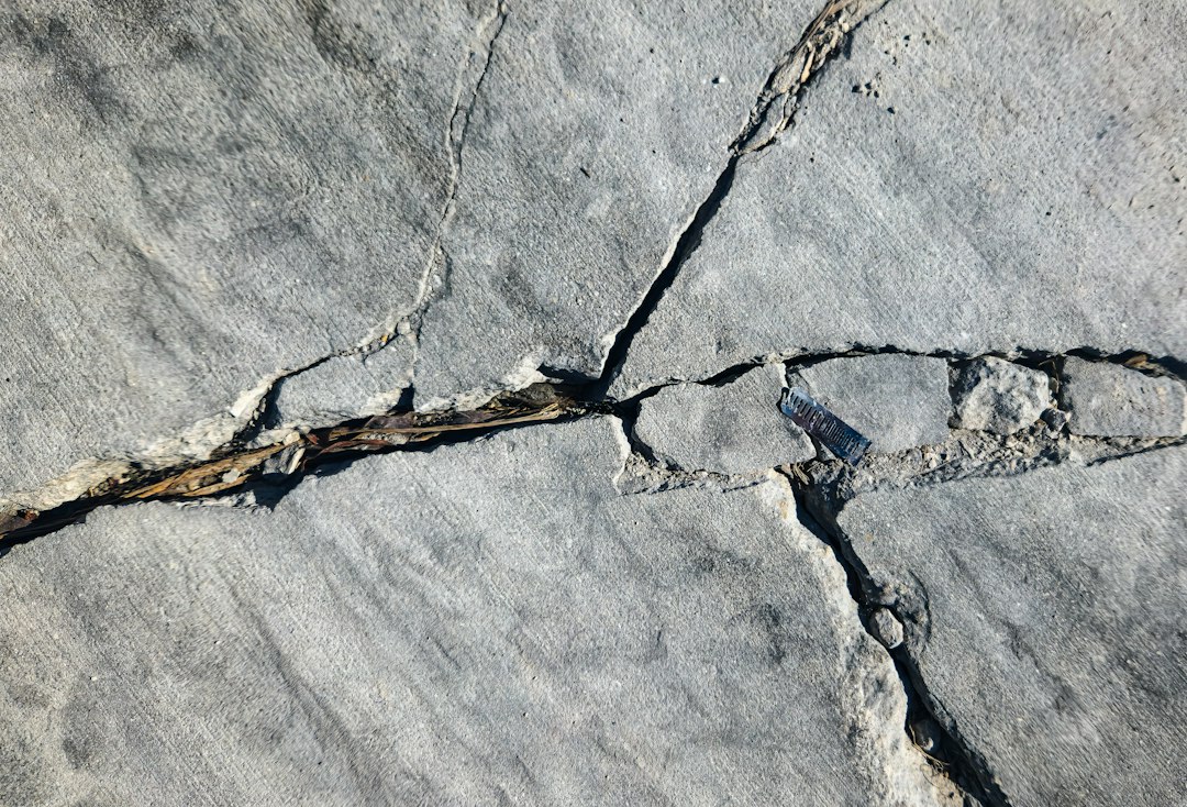 Illustrative pavement damage, not a customer driveway or a diagnosis