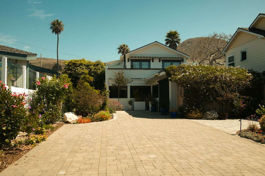 Residential driveway at a landscaped home, illustrative stock photograph